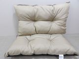 a chair that has a pillow on top of it