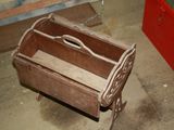 a small wooden box that is sitting on the floor