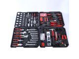 a tool kit in a black case on a white surface