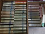 a box full of books that are sitting on the floor