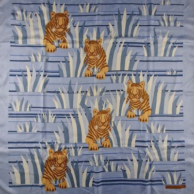 a blue and orange tiger print on a blue background