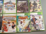 a lot of video game covers on the table