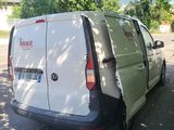 a van that is parked on the side of the road