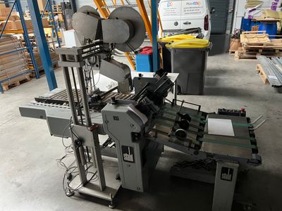 an image of a machine that is in a warehouse