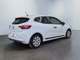 the rear end of a white car in a white room
