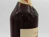 a bottle of alcohol that is sitting on a table