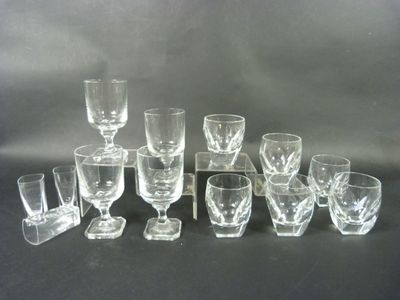 a lot of glasses that are sitting on a table