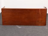 an image of a small wooden box on the floor in a room