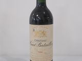 a bottle of wine that is sitting on a table