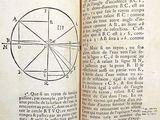 an open book with a drawing of a circle inside of it
