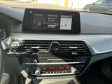 the dashboard of a car with a digital display in the center