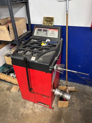 an image of a machine in a garage with tools