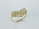 a close up of a gold ring with diamonds on a white background