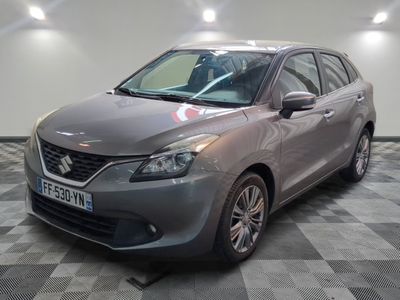 a picture of a grey car parked in a garage