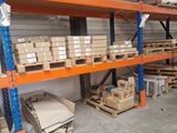 many boxes and boxes on the shelves in the warehouse