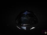 an image of a black diamond in the dark