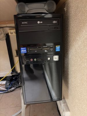 a computer that is sitting on top of a stand
