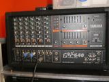 two speakers and a mixer on top of each other