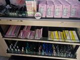 a display of cosmetics products on a shelf in a store