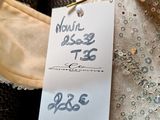 a label on a dress hanging on a hanger