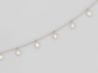 a diamond necklace and earring set