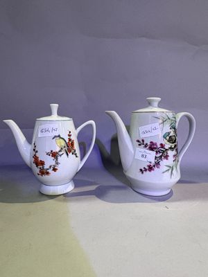 three teapots sitting next to each other on a table