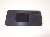 a black phone that is sitting on a table