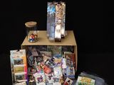 a cardboard box with a bunch of toys inside of it