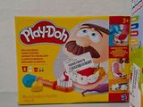 a box of play - doh and a box of play - doh on a table
