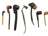 many different types of walking canes on a white background