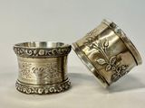 pair of antique silverplated napkin holders with floral designs