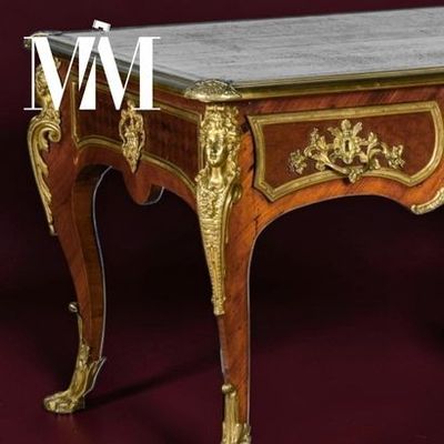 a table with a marble top on a red background