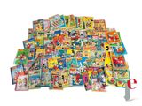 a pile of children ' s books and a pair of scissors