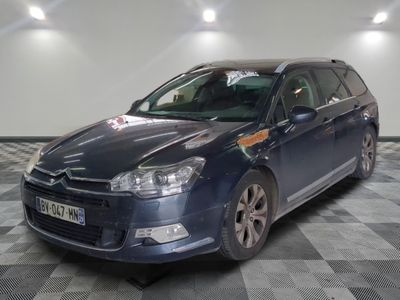 a picture of a blue car on a checkered floor