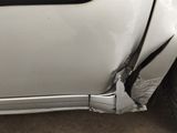 a car that has been badly damaged by a car accident