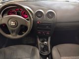 a dashboard of a small car with red lights on