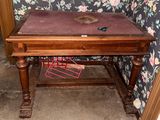 a wooden table with a magazine rack on top of it
