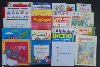 many children ' s books that are on the table