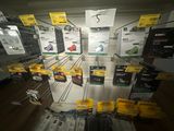 many different types of electronics on display in a store
