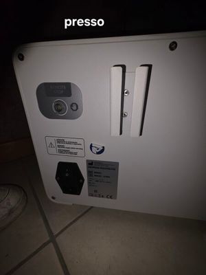 a white refrigerator that is sitting on the floor
