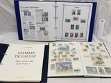 un grand nombre de livres ouverts sur une table