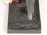an image of a statue of a horse with a tag on it ' s neck