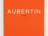 an orange book with the word aubertin written on it
