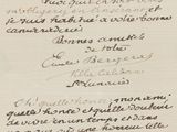 an old handwritten letter on a piece of paper with writing on it