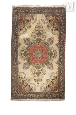 an antique rug with a floral design on a white background