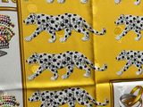leopards and leopards on a yellow and white scarf with gold trim