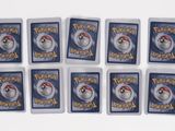 six pokemon trading cards with a white and blue design on them