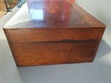 a wooden box that is sitting on a table