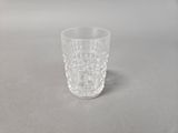 a glass that is sitting on a table