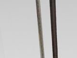pair of chinese swords with gold and black wood handles